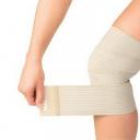 Hur man lindar ett elastiskt bandage runt knäet